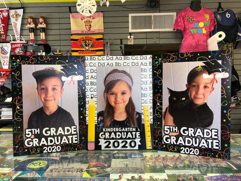 Kindergarten and 5th grade graduate signs